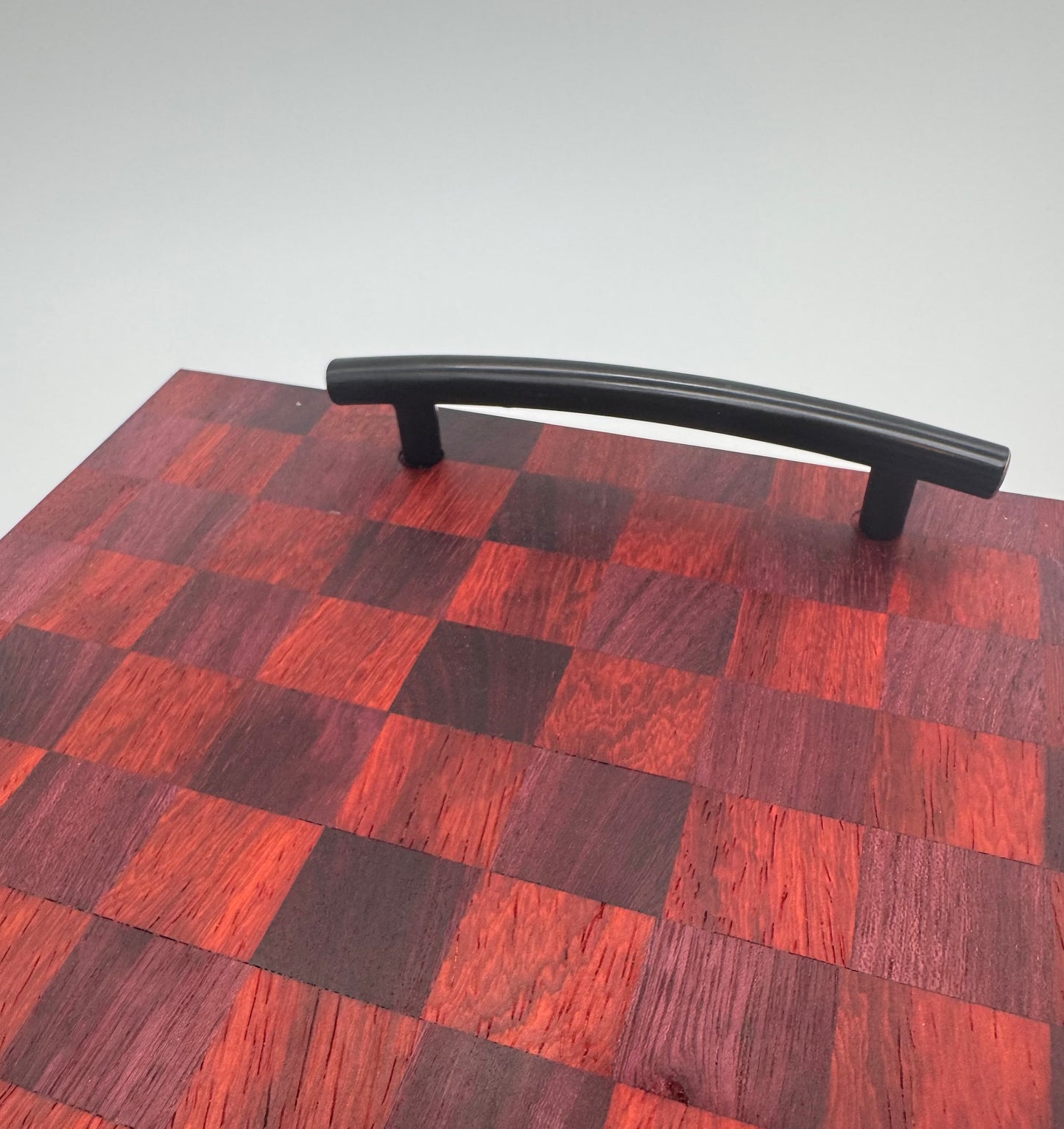 The "Purple Red Checker 3D Handel” 14inch Charcuterie Board with Legs