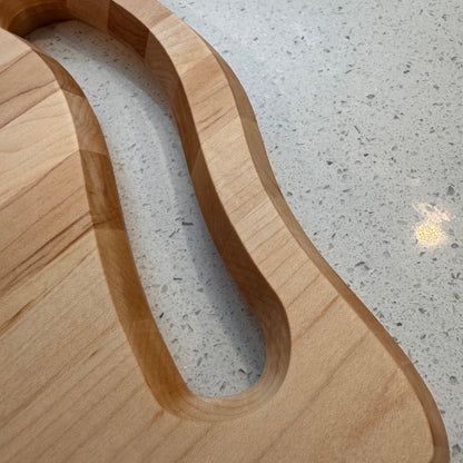 The "Plain Jane Curvy Maple" Cutting Board