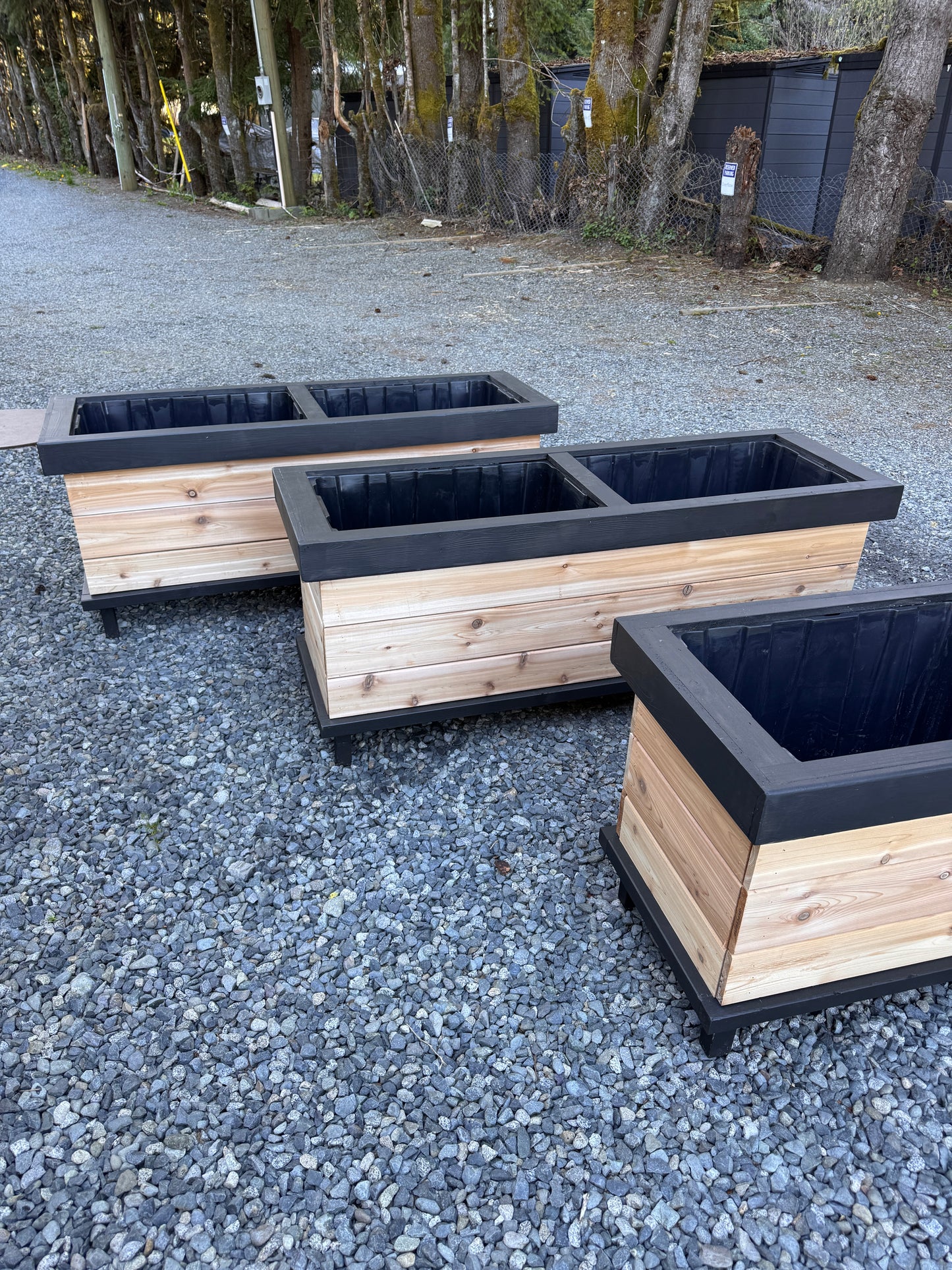 The “Stiletto 63” 63”x21”x25” Cedar Series Planter box with totes everlasting technology