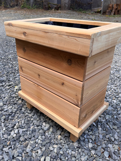The “Stiletto Mini 23” 23”x15”x25” Cedar Series Planter box with totes everlasting technology