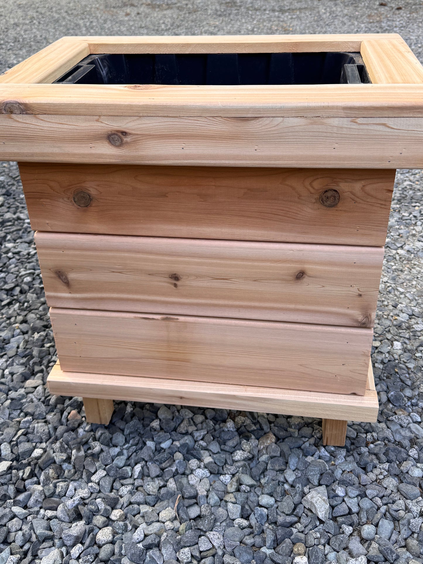 The “Stiletto Mini 23” 23”x15”x25” Cedar Series Planter box with totes everlasting technology