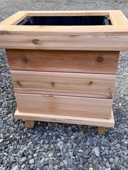The “Stiletto Mini 23” 23”x15”x25” Cedar Series Planter box with totes everlasting technology