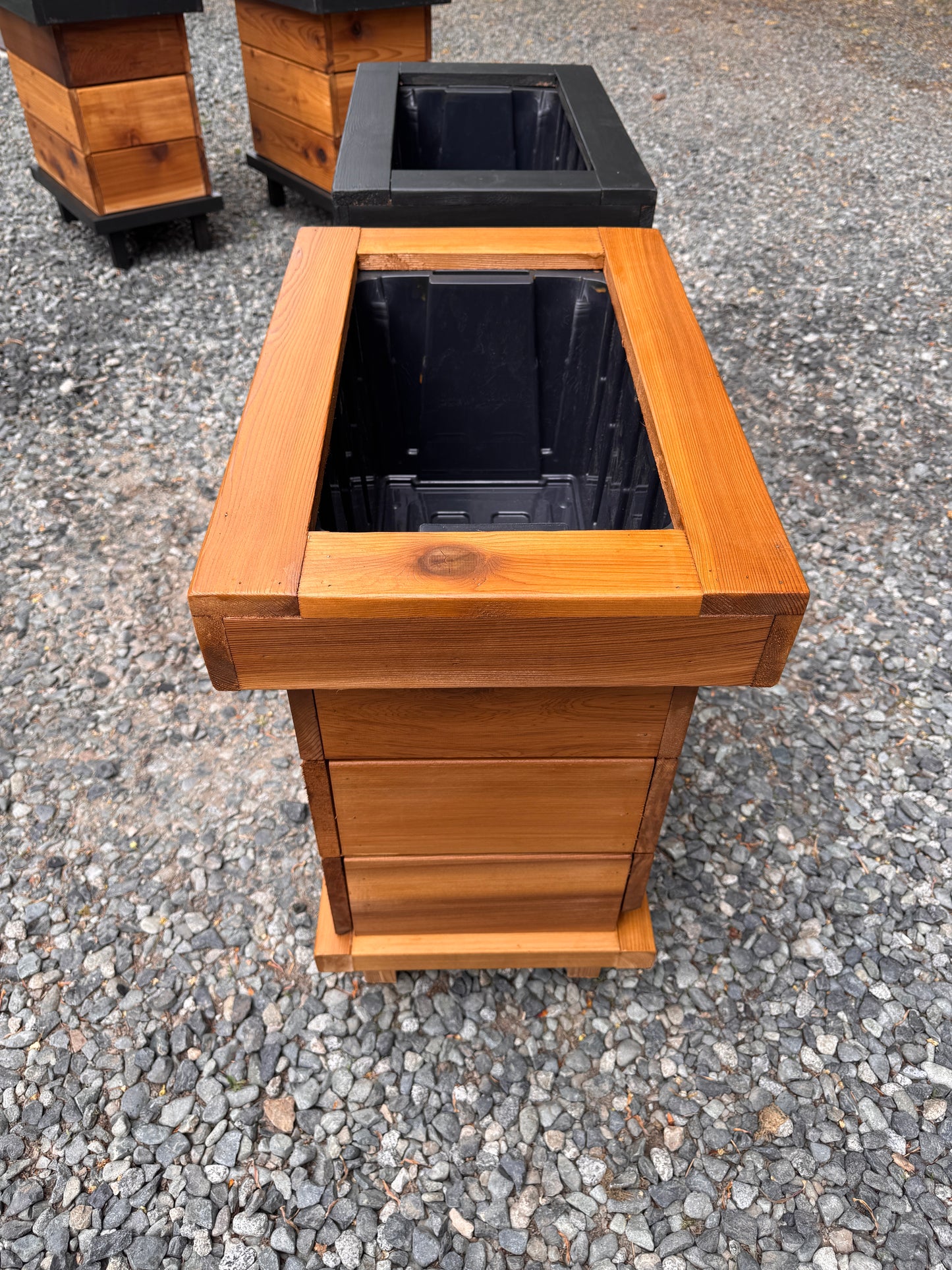 The “Stiletto Mini 23” 23”x15”x25” Cedar Series Planter box with totes everlasting technology