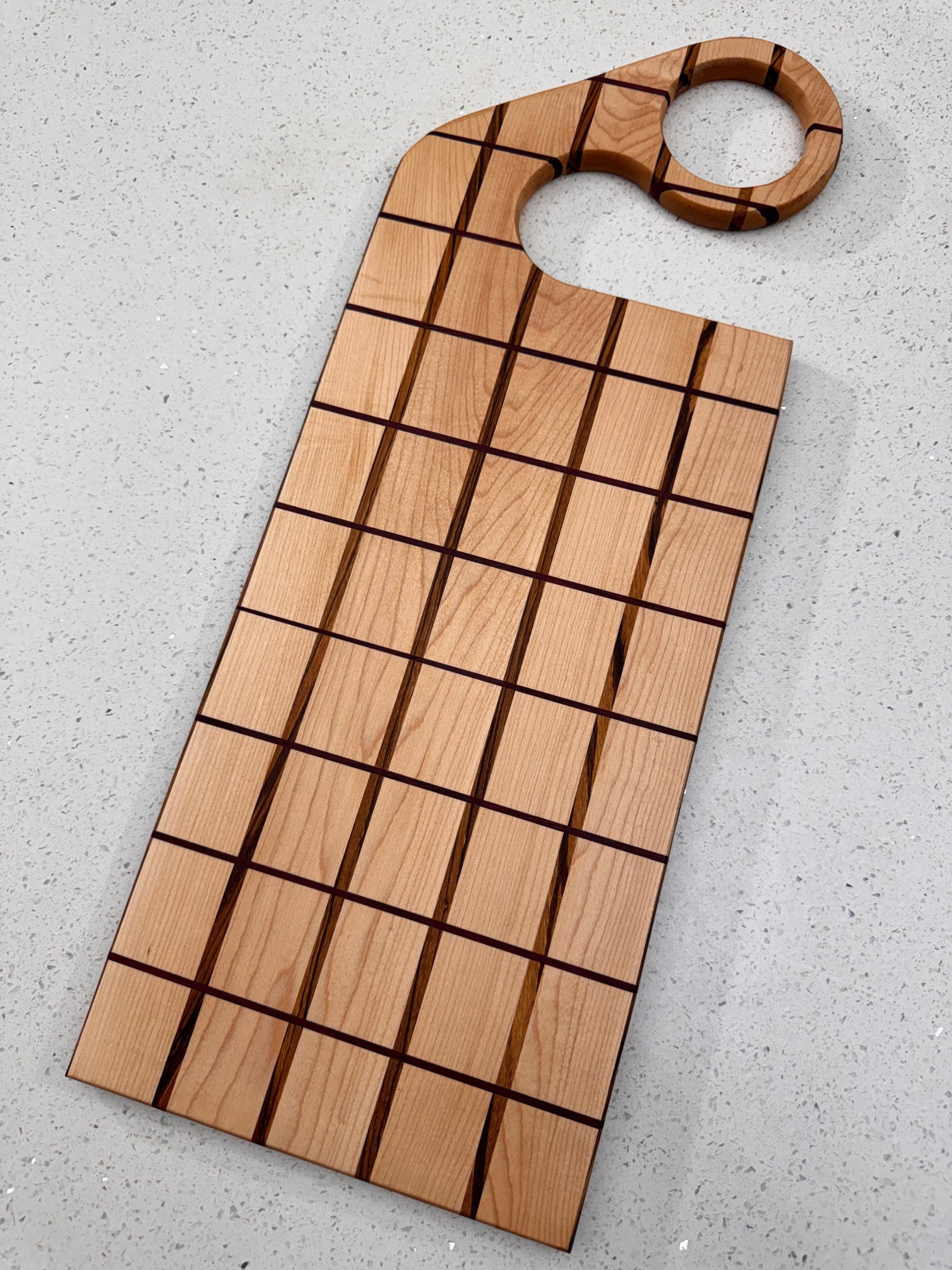 The "Funky Handle Impossible" Cutting Board