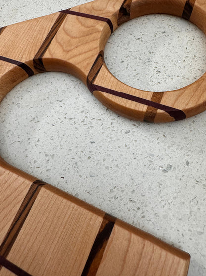 The "Funky Handle Impossible" Cutting Board