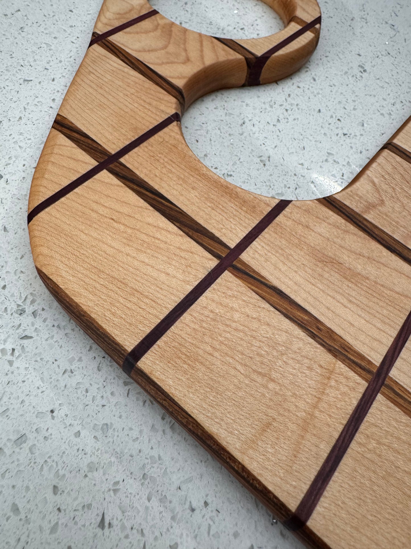 The "Funky Handle Impossible" Cutting Board