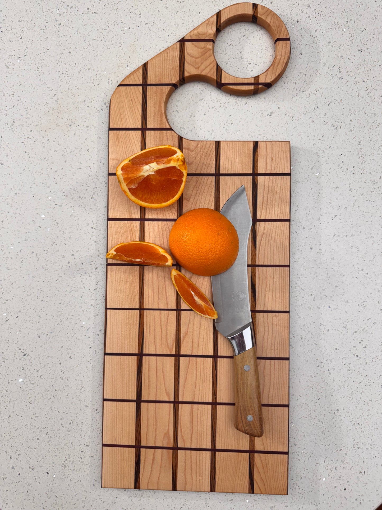 The "Funky Handle Impossible" Cutting Board