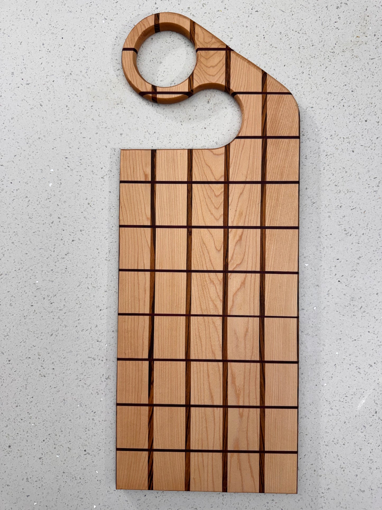 The "Funky Handle Impossible" Cutting Board