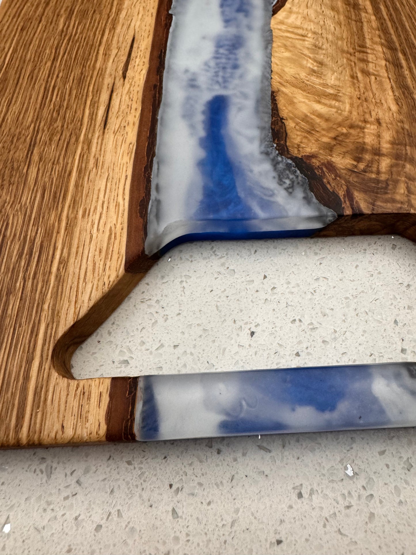 The "Blue River Bottom Upper Sky" Serving Board