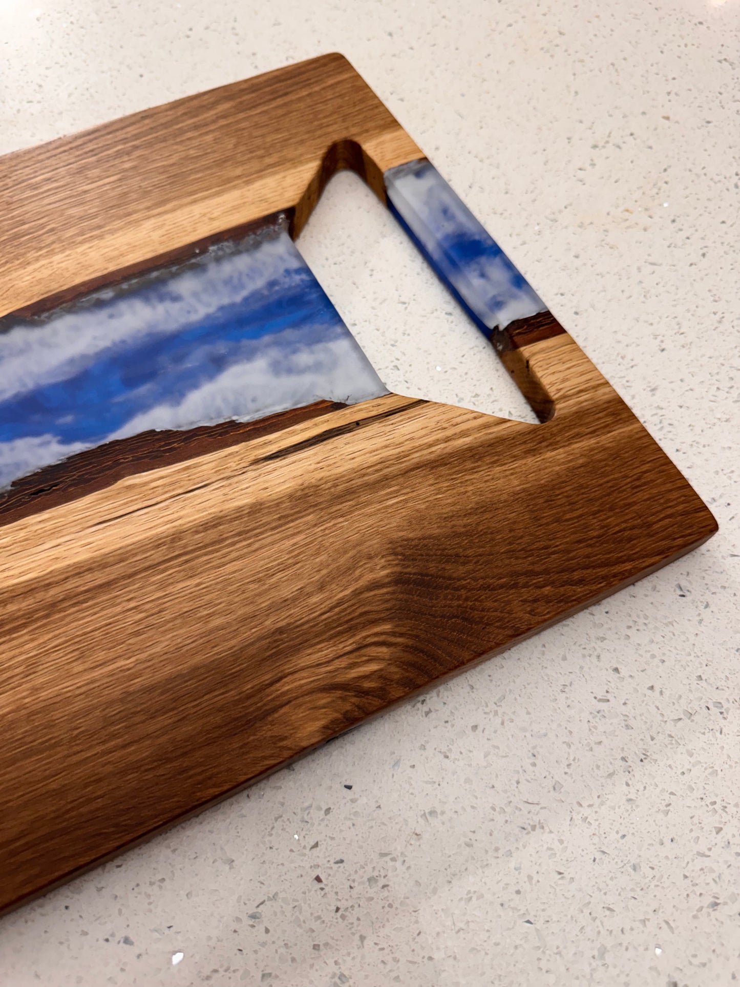 The "Blue River Bottom Upper Sky" Serving Board